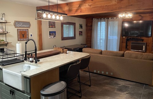 Seven Springs House | Get cozy for the winter in this 3 floor, 4 bedroom rustic ski home