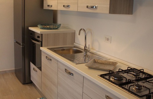 Baia Sant'Anna Villa | Get relaxed splashing in a private swimming pool or sunbathe on the nearby beach