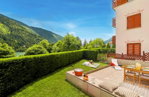 Molveno Apartment | Giardino sul Lago - Vista su lago e montagne a Molveno