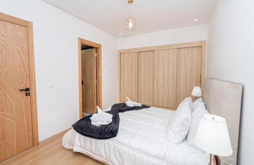 Tangier Apartment | Glorious Garden, Appartement Familial, Face au Stade Ibn Batouta, Espaces Verts, Proche Aéroport, Parking, WIFI, AC, IPTV