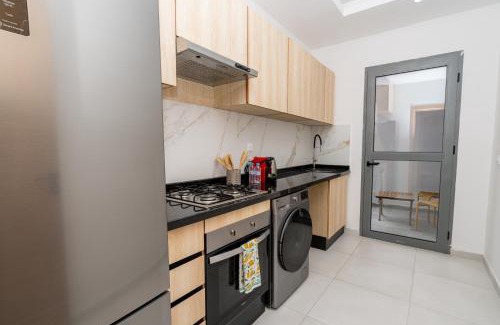Tangier Apartment | Glorious Garden, Appartement Familial, Face au Stade Ibn Batouta, Espaces Verts, Proche Aéroport, Parking, WIFI, AC, IPTV