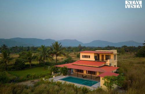 Alibaug Villa | Golden Sunsets by StayVista - Refreshing pool, serene lawn - your tranquil retreat