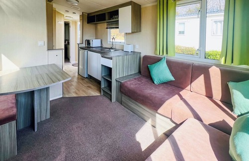 Saint Ann's Chapel House | Good quality, modern family caravan with one double and one twin.