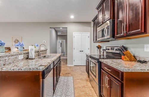Seville House | Gorgeous 3/2 Corner Lot with Firepit and Grassy Yard!