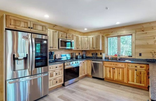 Carrabassett Valley Cabin | Gorgeous dog-friendly cabin with great view, deck, hot tub, & gas fireplace