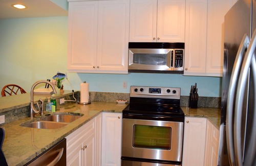 Estate Enighed Condo | Grande Bay SUNSWEPT, 2 BR 2 Bath Oceanfront Resort, Walk to Town