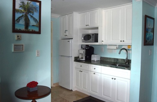 Estate Enighed Condo | Grande Bay SUNSWEPT, 2 BR 2 Bath Oceanfront Resort, Walk to Town