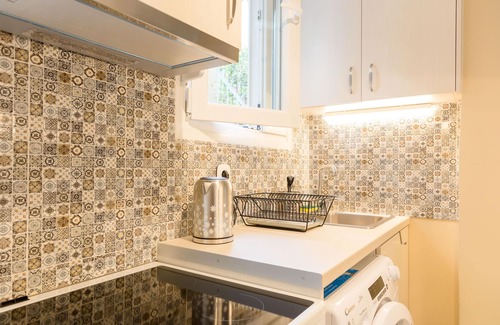 Petralona Apartment | Grandma's Chic & Bright Athenian home with a Patio