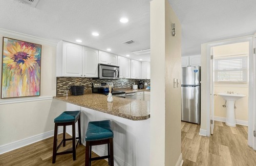 Miramar Beach House | Grill out with private beachfront views in the heart of Miramar!