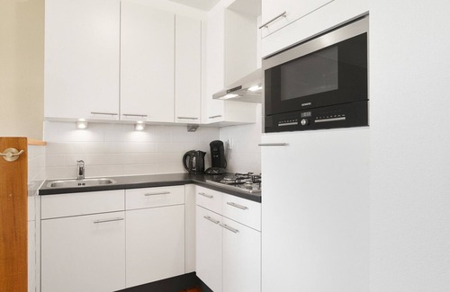 Brouwershaven Cottage | Ground floor 4-person apartment at the lake