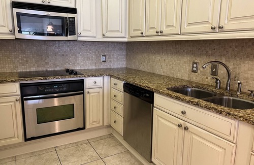 Ono Island Condo | Ground floor condo with walk out access to docks, fishing piers and pool