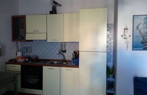 Torpe House | Ground floor house with two small gardens and covered veranda