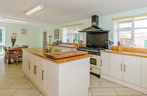 Wisbech Cottage | Ground floor: Three living areas, two with open fire, TV with Freeview/DVD.
