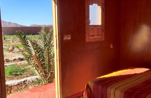 Tamegroute Bed & Breakfast | Guest room in authentic desert farmhouse