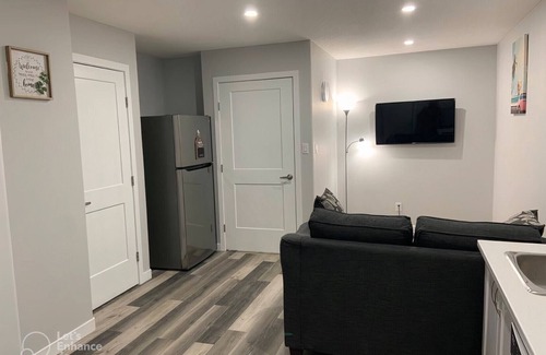 Regina House | Guest Suite in Regina - Queen Bed