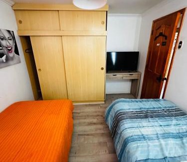 Calama House | Habitación baño compartido