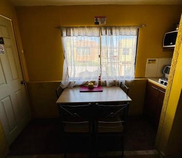 Calama House | Habitación baño compartido