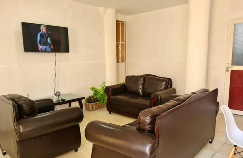 Atlixco House | Habitación privada en edificio céntrico (amarillo)