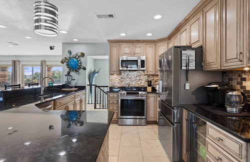 Holiday Isle House | HARBOR OASIS-WATERFRONT/BOAT/PWC SLIPS/Dock/Pool/Spa/ Kayaks/Bikes/Volleyball+