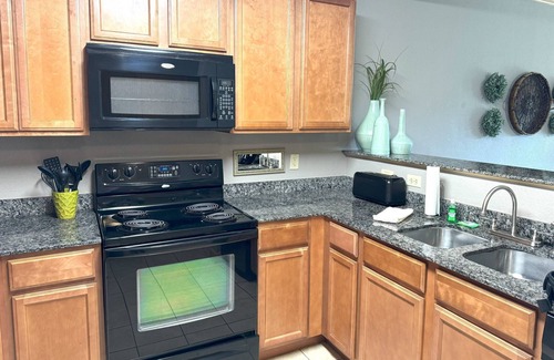 Pigeon Forge Condo | Heart of Pigeon Forge w/Balcony, WiFi, Indoor/Outdoor Pools, Playground & Dinner Show Tickets