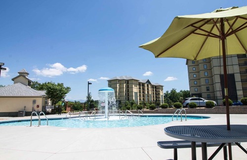 Pigeon Forge Condo | Heart of Pigeon Forge w/Balcony, WiFi, Indoor/Outdoor Pools, Playground & Dinner Show Tickets