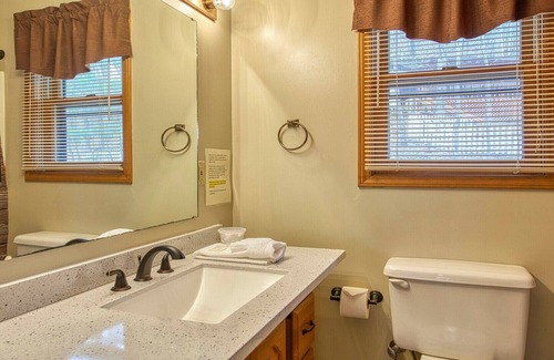Maggie Valley Cabin | Hidden Cove Hideaway provides rustic enjoyment, views, hot tub, WiFi, AC.