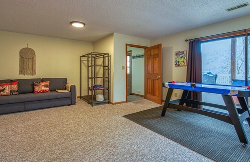Maggie Valley Cabin | Hidden Cove Hideaway provides rustic enjoyment, views, hot tub, WiFi, AC.