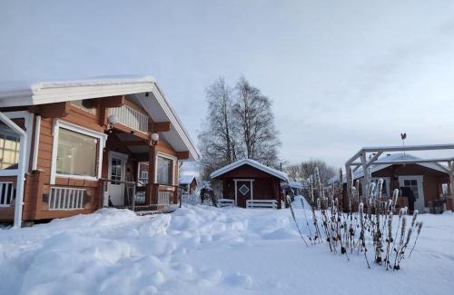 Pudasjarvi Ski Chalet | Hirsimökki harjulla