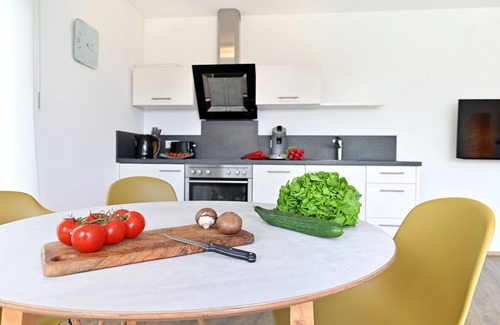 Enzisweiler Apartment | Holiday Apartment 'Dinkelbach Feriendomicil 2 B Flair' with Mountain View and Elevator