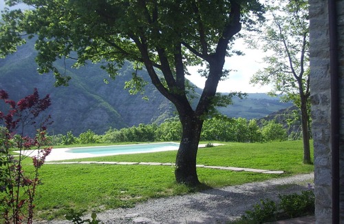 Lizzano in Belvedere House | Holiday Home in Imola with Forest & Pool