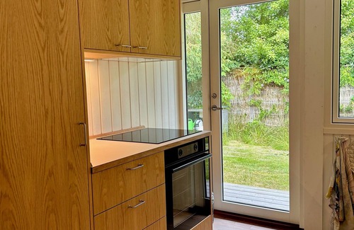 Hojby Cottage | Holiday home by Denmark's best beach, with large terrace & family activities