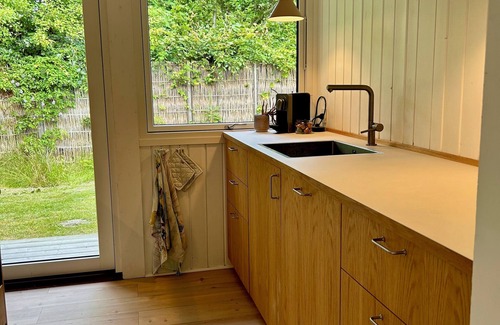 Hojby Cottage | Holiday home by Denmark's best beach, with large terrace & family activities