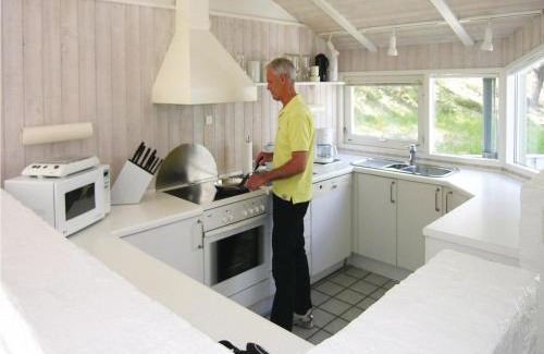 Spidsegard House | Holiday Home Flæskatjiving Nexø Denm