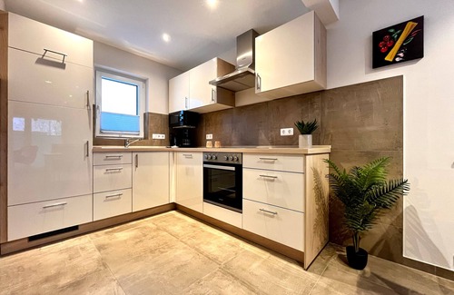Hasselfelde House | Holiday Home 'Haus Leni' with Private Terrace, Private Garden and Wi-Fi