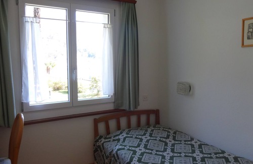Minusio House | Holiday home in beautiful location, quiet, view of Lake Maggiore, pool
