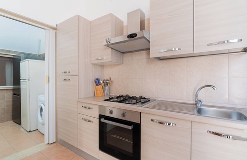 Torre Lapillo House | Holiday Home 'Nina' with Private Garden and Air Conditioning