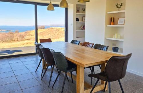 Breakish House | Holiday Home The Longhouse by Interhome