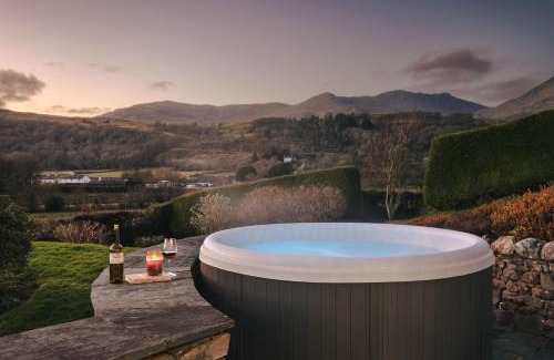 Torver House | Hollace, Lake District bungalow with hot tub and stunning views