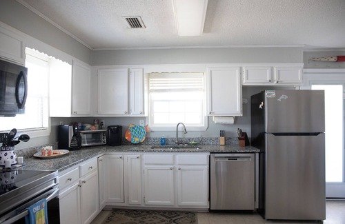 Silver Cay House | Home on water w/boat dock. 3 bed, 3 bath. Sleeps 9. Sunsets, beaches, fishing.