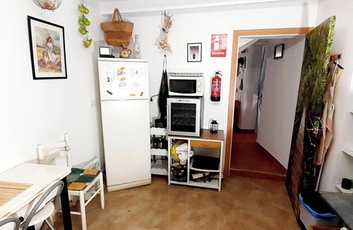 Illar House | Homerez - Charming House in Íllar with Mountain View and Balcony