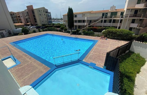 Cap d'Agde Apartment | Homerez - Cosy Apartment in Agde with Shared Pool