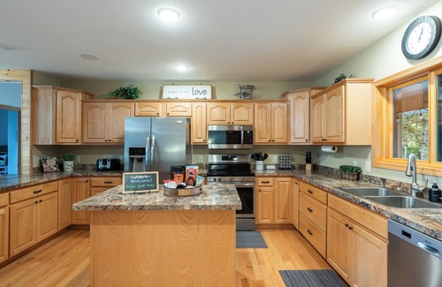 Merrifield Cabin | Horseshoe Lake Cabin with Hot Tub, Games, Fire Pit, Snowshoes, Snowmobile Trails