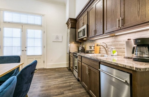 Central Business District Condo | Hosteeva | 2BR Condo Blocks to Bourbon St.