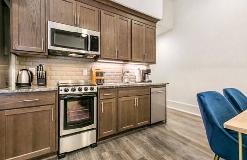 Central Business District Condo | Hosteeva | 2BR Condo Blocks to Bourbon St.