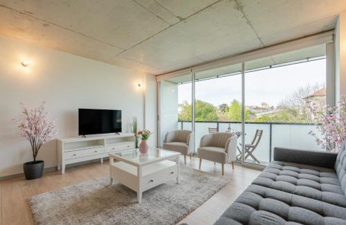 Vila Nova de Gaia Apartment | HostWise - Modern Flat w/Balcony, Garage & Pool