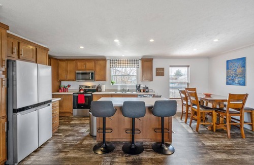 Dupont House | HOT TUB - Entire NEW Home - Walk to Light Rail - King Beds - Firepit Theatre