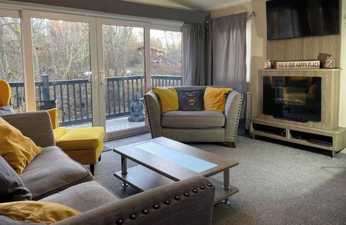 Morpeth Cabin | Hot tub lodge getaway with bar & many locals attractions, beaches, zoo ect