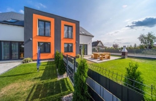 gmina Wolin House | House KATAMARAN 4 Bedrooms Baltic Sea Sea view Garden Barbecue W-Lan Playground Fishing