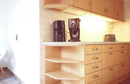 Esens Apartment | House Meereswind 3xbedroom, conservatory with fireplace, office, on the Westerkaye