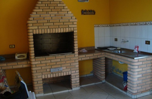 Peruibe House | House on the beach with Pool and Barbecue. Air conditioning.